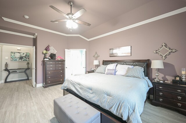 bedroom with ceiling fan, ornamental molding, light wood-type flooring, and vaulted ceiling