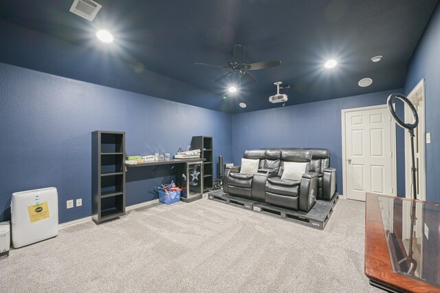 cinema with ceiling fan and carpet