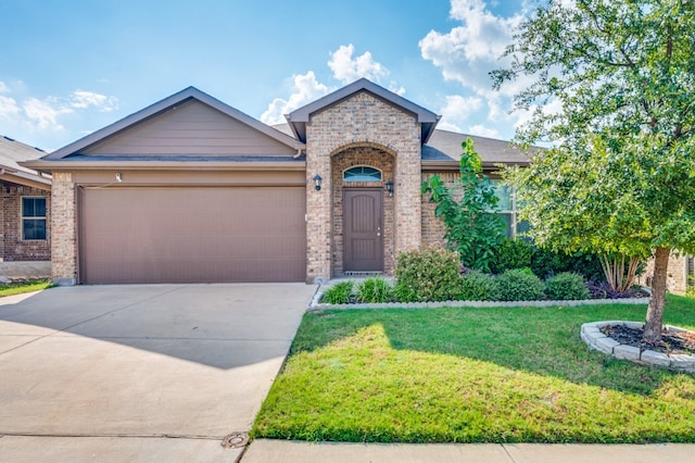 view of front facade featuring a garage and a front yard