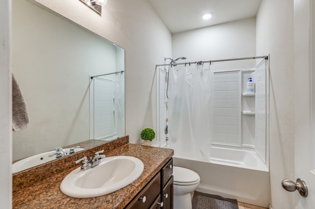 full bathroom featuring toilet, vanity, and shower / tub combo with curtain