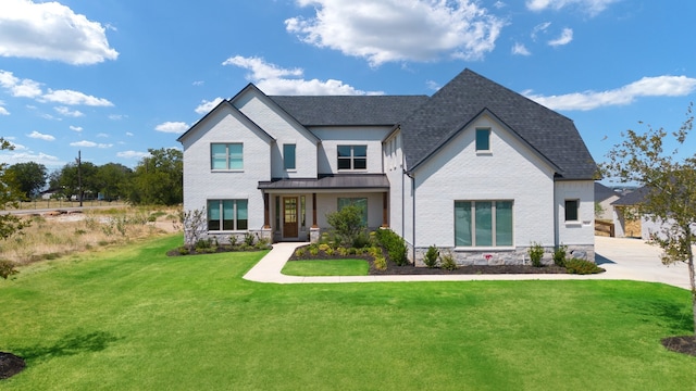 view of front of house with a front lawn