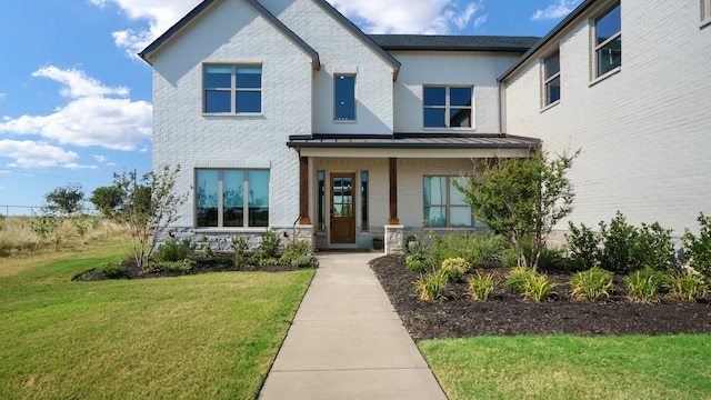 view of front facade with a front yard