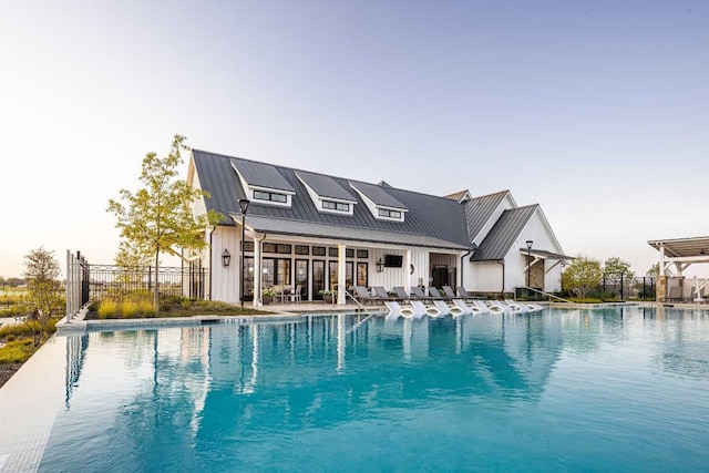 view of swimming pool with a patio