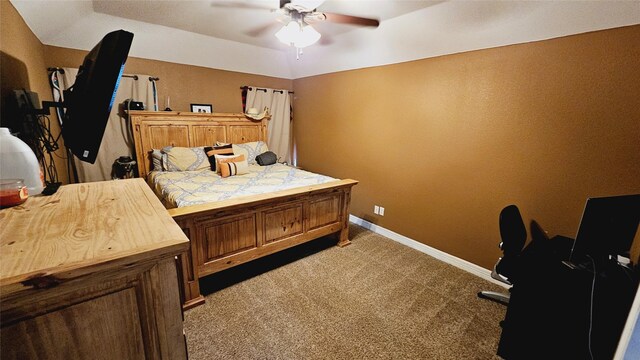 bedroom featuring multiple windows, vaulted ceiling, and hardwood / wood-style floors