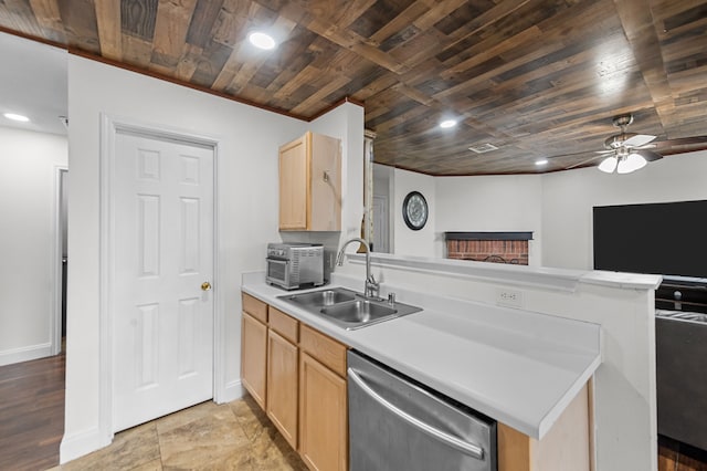 kitchen with dishwasher, light brown cabinetry, kitchen peninsula, and sink