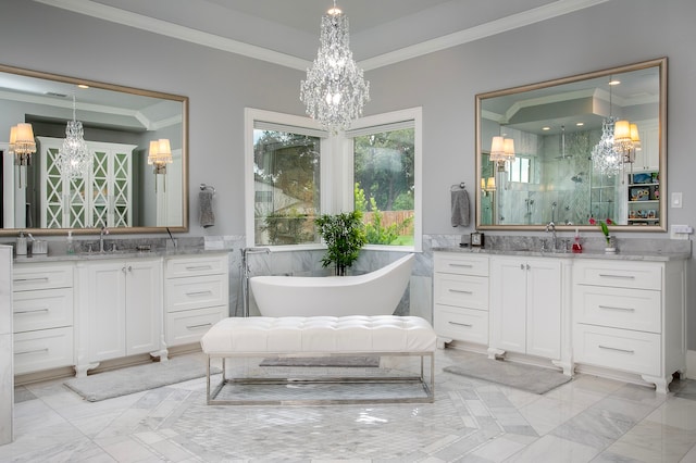 bathroom featuring an inviting chandelier, vanity, plus walk in shower, and crown molding