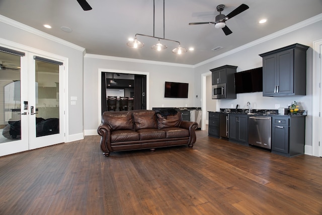 living room featuring ornamental molding, ceiling fan, dark wood-type flooring, and french doors