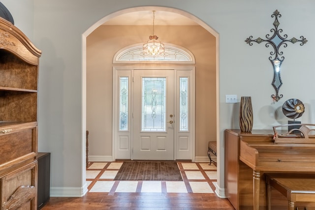 entryway with wood-type flooring