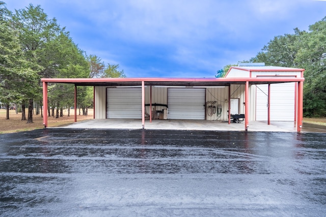 garage with a carport