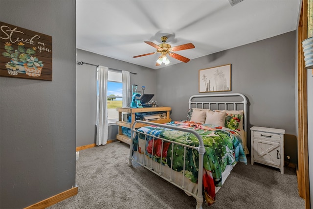 bedroom featuring ceiling fan and carpet flooring