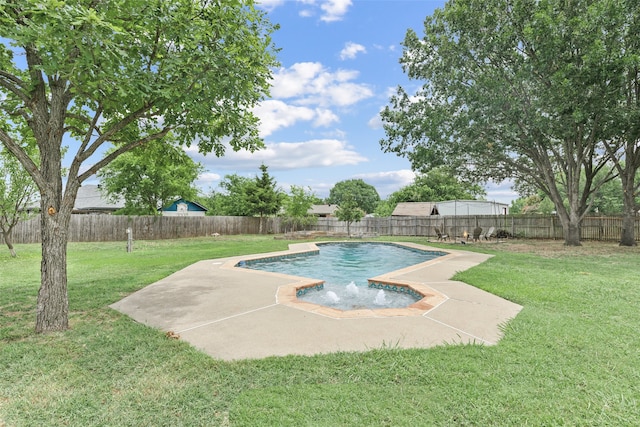 view of pool with a yard and pool water feature