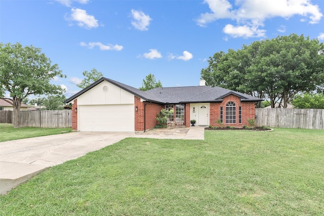 ranch-style home featuring a garage and a front lawn