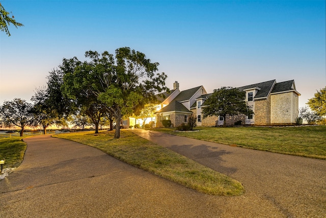 view of front of home featuring a yard