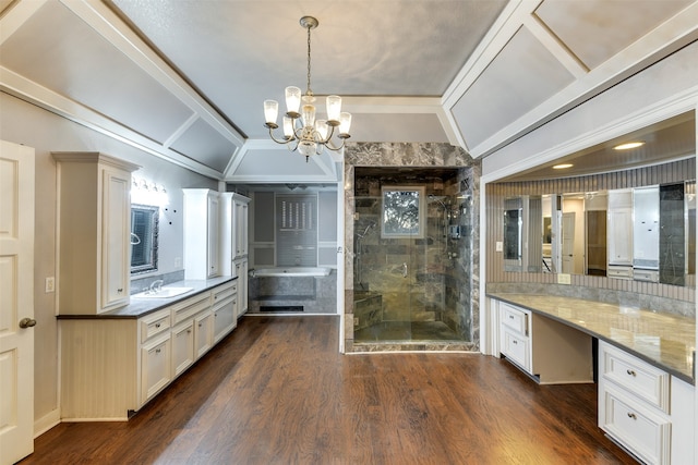 bathroom featuring hardwood / wood-style floors, a notable chandelier, crown molding, vanity, and a shower with shower door