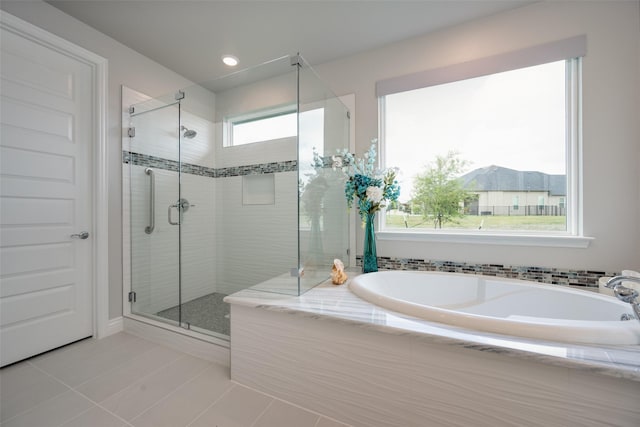 10008 Baywood Ct, Denton, TX 76207 - full bath with a shower stall, a bath, and tile patterned flooring