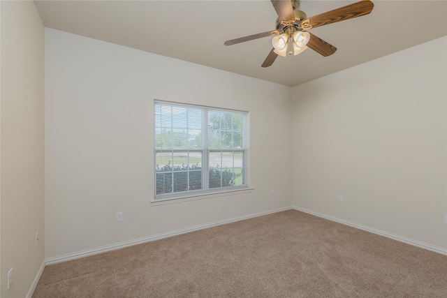 empty room with light carpet and ceiling fan