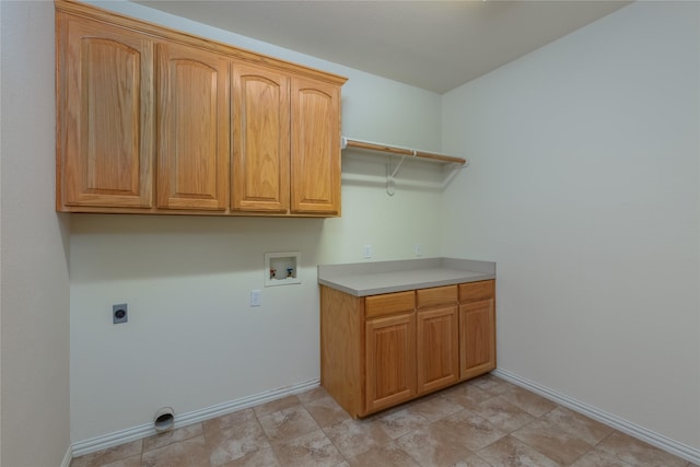 laundry area featuring washer hookup, cabinets, and hookup for an electric dryer