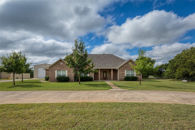 single story home featuring a front yard