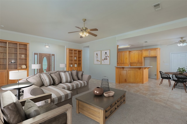 living room featuring crown molding, ceiling fan, and light tile patterned floors