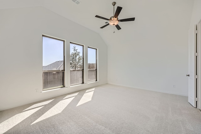 unfurnished room with lofted ceiling, light colored carpet, and ceiling fan