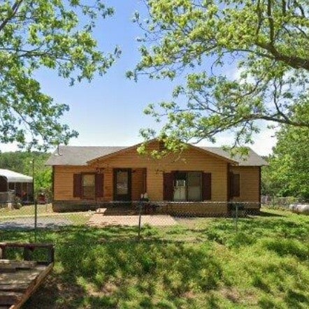 view of front of home with a front yard