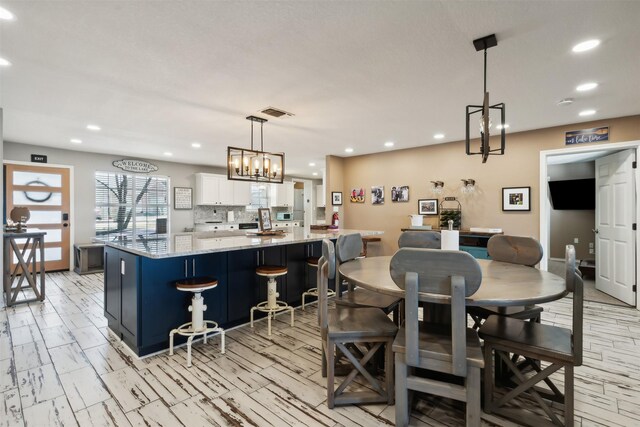 dining room featuring an inviting chandelier