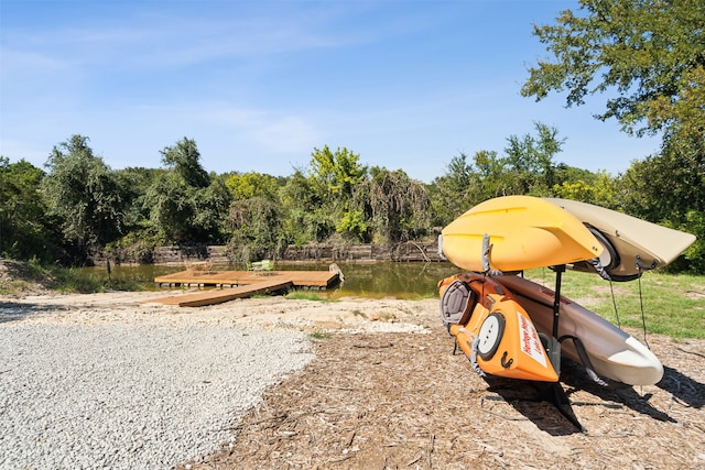 view of play area featuring a water view