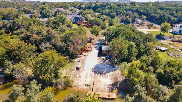 aerial view with a wooded view