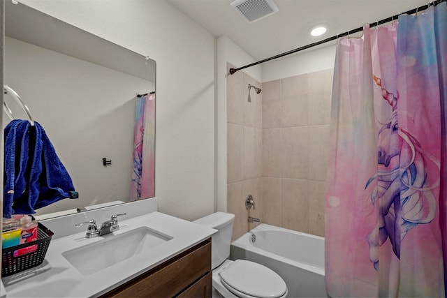 full bathroom featuring vanity, toilet, and shower / tub combo with curtain