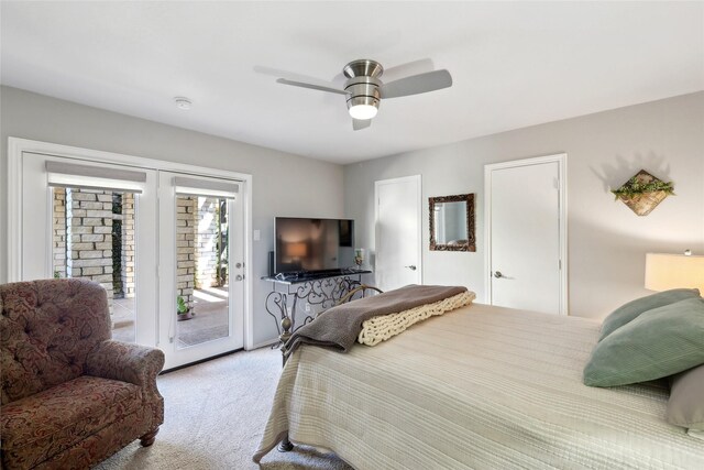 bedroom featuring access to exterior, ceiling fan, and light carpet