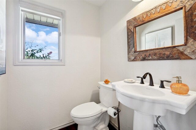 bathroom featuring sink and toilet