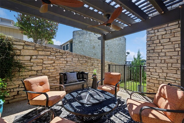 view of patio / terrace with ceiling fan, an outdoor living space, and a pergola