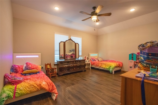 bedroom featuring ceiling fan and dark hardwood / wood-style flooring