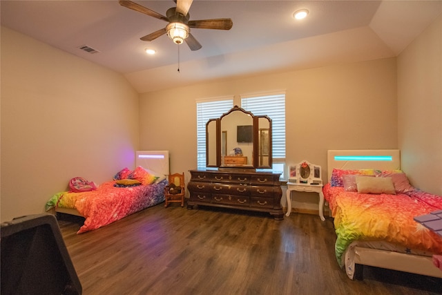 bedroom with lofted ceiling, ceiling fan, and dark hardwood / wood-style floors