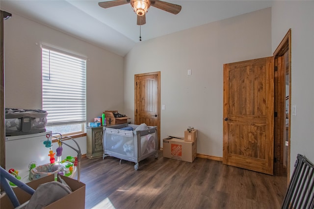 office area featuring a wealth of natural light, ceiling fan, dark hardwood / wood-style floors, and vaulted ceiling