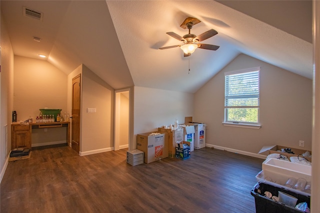 bonus room with vaulted ceiling, a textured ceiling, ceiling fan, and dark hardwood / wood-style floors