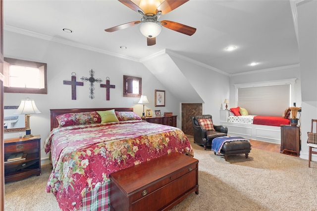 bedroom featuring crown molding, carpet, and ceiling fan