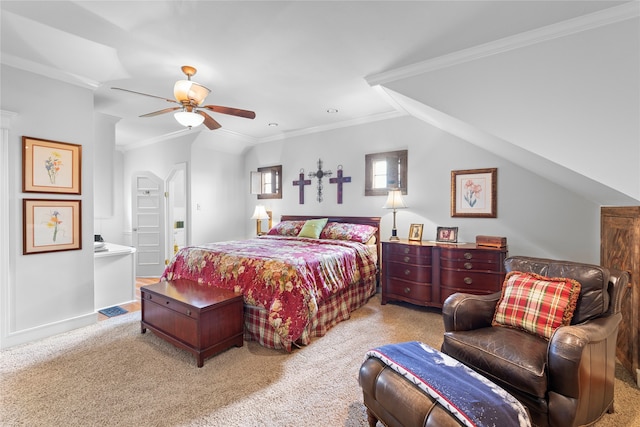 carpeted bedroom featuring ceiling fan, ensuite bathroom, and crown molding