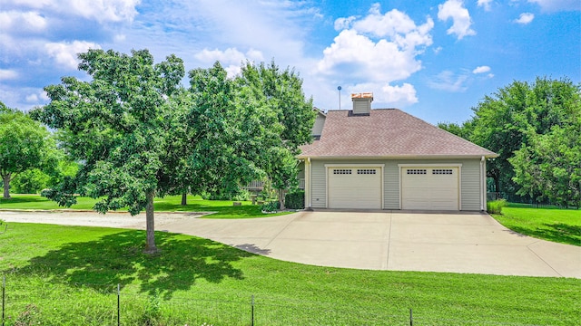 view of property exterior with a yard and a garage