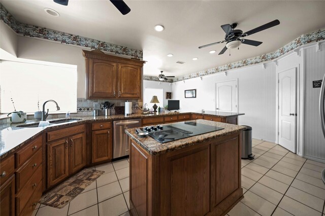 kitchen with a kitchen island, dishwasher, kitchen peninsula, black electric stovetop, and ceiling fan