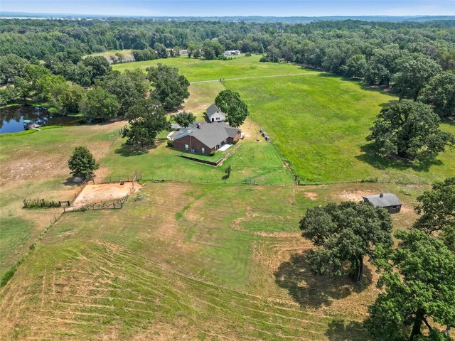 drone / aerial view featuring a rural view and a water view