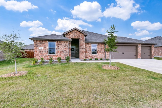 ranch-style house featuring brick siding, driveway, a front lawn, and a garage