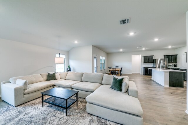 living room featuring light wood-type flooring