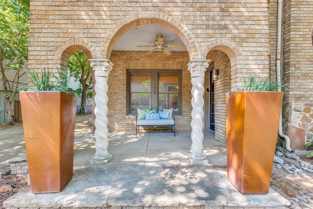 doorway to property featuring ceiling fan