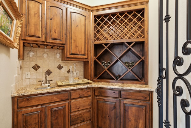 wine cellar featuring indoor wet bar