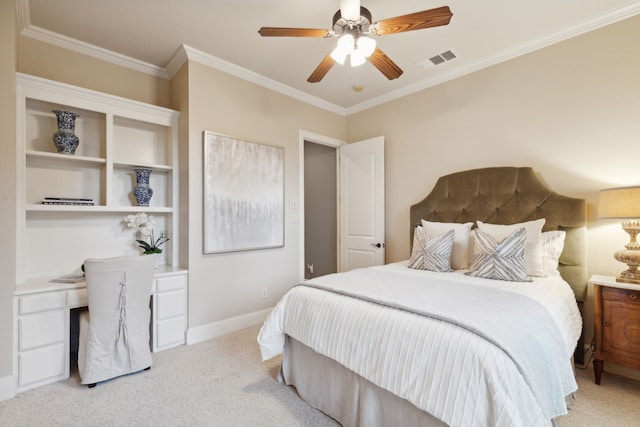 carpeted bedroom featuring ceiling fan and crown molding