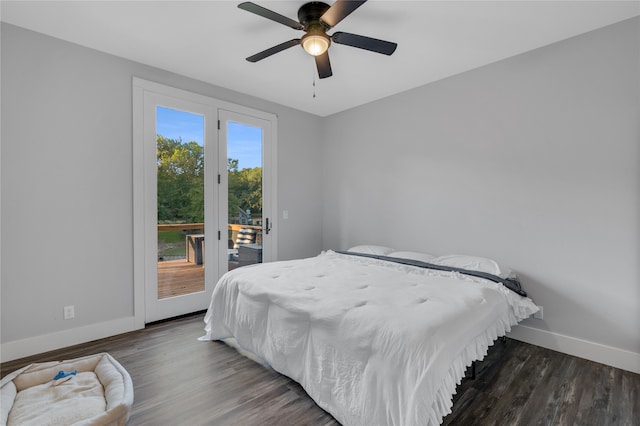 bedroom with ceiling fan, dark hardwood / wood-style floors, and access to exterior