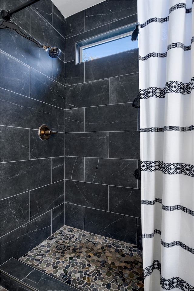 bathroom with curtained shower