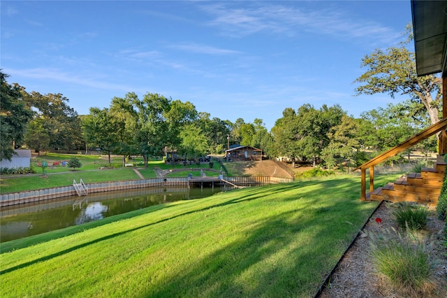 view of yard with a water view