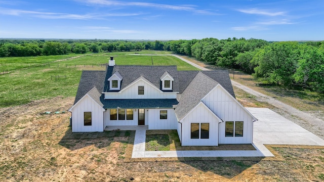 exterior space with a rural view